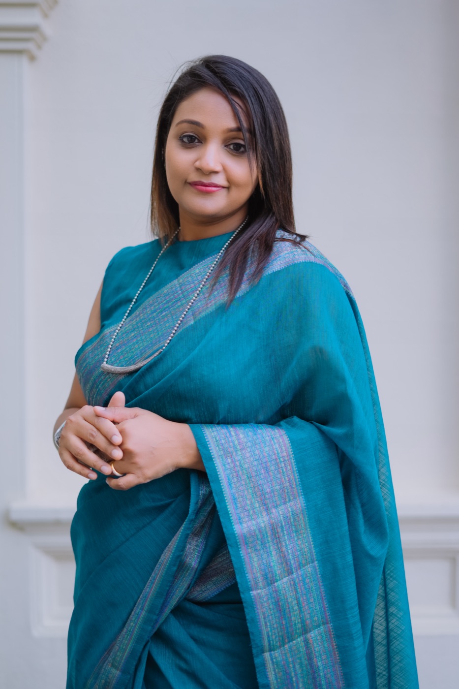 Shivalatha Sivasundaram in a teal sari