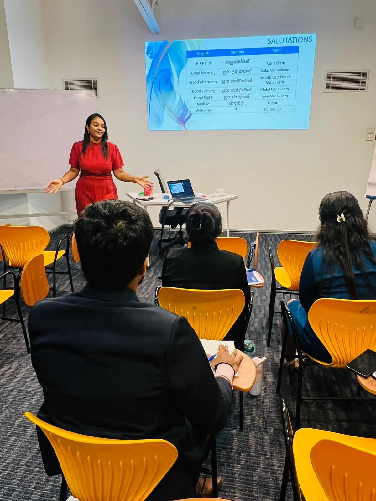 Shivalatha delivering a trilingual language training session